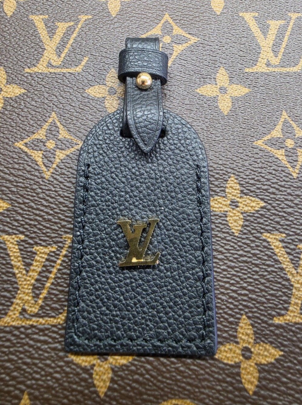 Louis Vuitton Black Leather Name Tag with Gold Logo